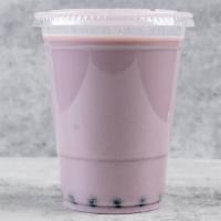 Taro Boba Tea · Boba Tea made from Black tea and topped with our original brown sugar tapioca pearls.