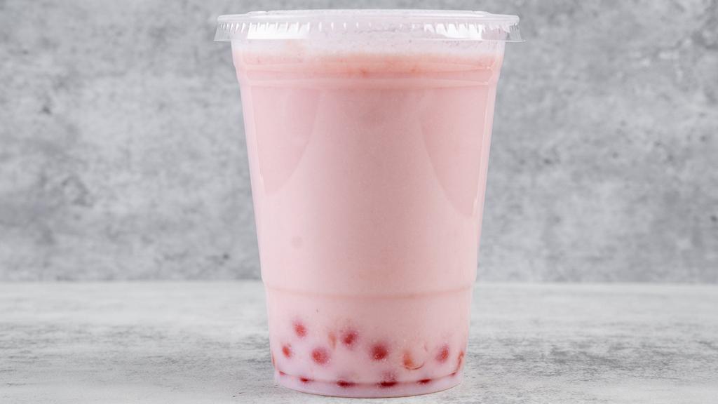 Strawberry Boba Tea · Boba Tea made with Green tea and topped with Strawberry Popping Pearls.