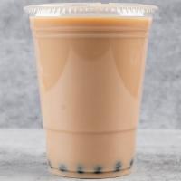 Milk Tea · Black Tea and milk mixture topped with our original brown sugar tapioca pearls.