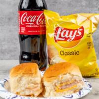 Turkey Sandwich Combo · Turkey and cheese sandwich in Hawaiian buns, chips, and bottled drink.