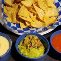 Texas Trio · Gluten-free. House-made Salsa - Homemade Queso - Homemade Guacamole.