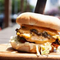 Mcdowell Smashburger · Smash Patties - Split Top Bun - Thousand Island Dressing - Lettuce - Tomato - American Chees...