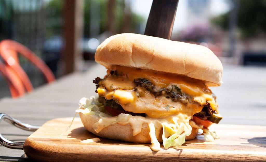 Mcdowell Smashburger · Smash Patties - Split Top Bun - Thousand Island Dressing - Lettuce - Tomato - American Cheese - Pickle