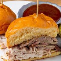Texas Brisket & Turkey Hero #31 · 1/2 lb of hot sliced brisket and turkey breast, melted jalapeno cheese, and a side of BBQ sa...