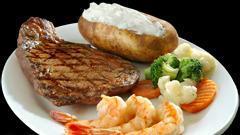 Steak And Shrimp · Served with baked potato and vegetables