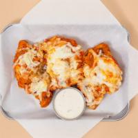 Italian Tenders · Three crispy fried chicken tenders smothered in marinara sauce and melted mozzarella with yo...
