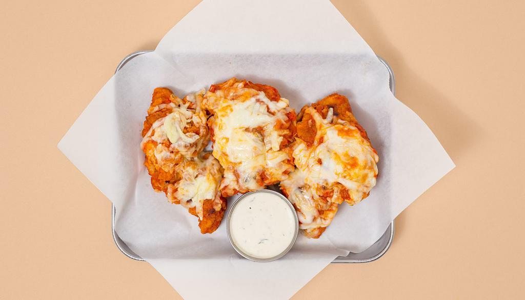 Italian Tenders · Three crispy fried chicken tenders smothered in marinara sauce and melted mozzarella with your choice of dipping sauce