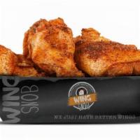 6Pc Traditional · Fresh, never frozen, deep fried bone-in wings. Includes a mix of flats and drums tossed in y...