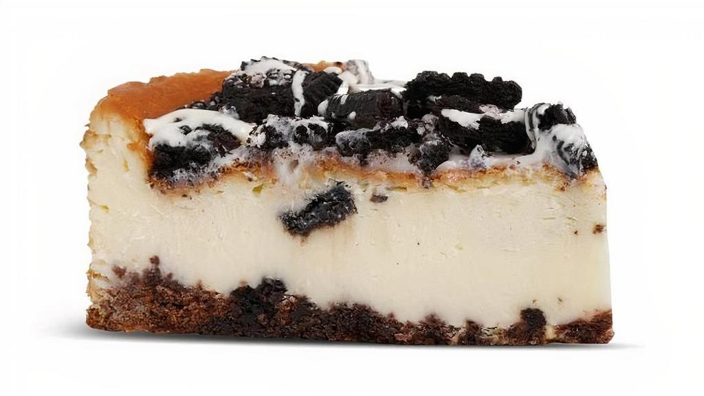 Oreo Cheesecake · Real Oreo cookie bits swirled into a classic New York style cheesecake, baked over a chocolate cookie crust and topped with cookies.