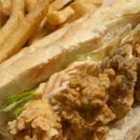 Fried Oyster Poboy · Hand Battered Oysters in a French Roll With Lettuce, Tomato and House Sauce