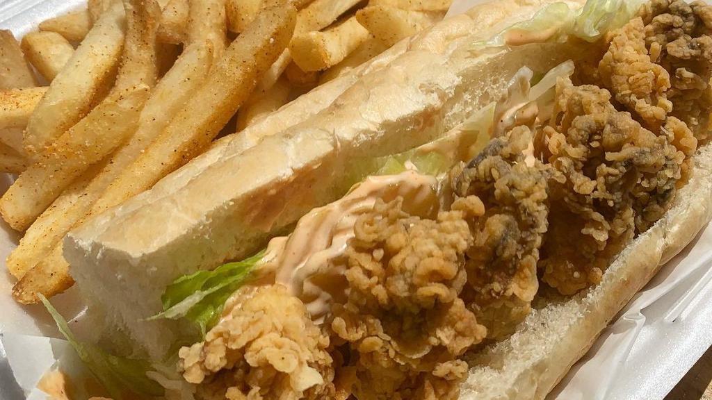 Fried Oyster Poboy · Hand Battered Oysters in a French Roll With Lettuce, Tomato and House Sauce