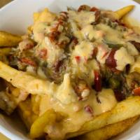 Big Easy Fries · French Fries Topped with Sautéed Crawfish and a Creole Cheese Sauce