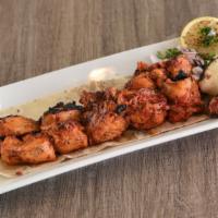Chicken Tikka · Two skewers of marinated chicken chunks
Served with one flatbread