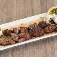 Beef Tikka · Two skewers of marinated beef medallions
Served with one flatbread