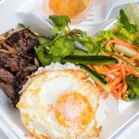 Rice Box (Cơm) · White rice topped with a fried egg and your choice of protein (chicken, grilled BBQ pork [th...