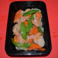 Shrimp With Snow Peas · Carrot, snow peas and water chestnuts sauteed in a light savory garlic sauce.