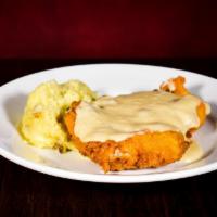 Country Fried Chicken · Tender chicken thighs hand-breaded, golden fried and topped with our lodge inspired scratch ...