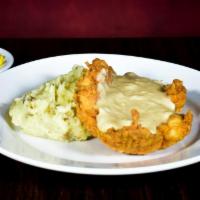 Country Fried Pork · Hand-breaded, tenderized pork loin fried and topped with our lodge inspired scratch made cre...