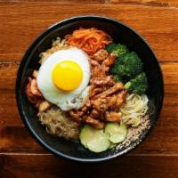 Regular Bowl · Your choice of rice, protein, toppings, and an egg served in a traditional Bibimbop Bowl.