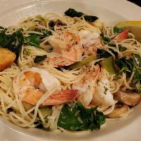 Shrimp Scampi Pasta	 · Gulf shrimp sautéed in garlic and lemon butter, served over angel hair pasta sautéed with fr...