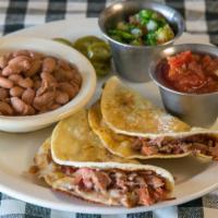 Brisket Tacos (2 Pieces) · Served with Pico de Gallo & Salsa