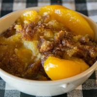 Peach Or Available Fruit Cobbler(Half Pan) · Serves 15. MUST BE ORDERED 24 HOURS IN ADVANCE.
