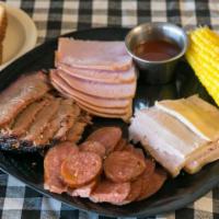 Big Tex With 2 Sides · 16 oz. Pick up to 4 meats, with our bbq sauce and 3 sides.