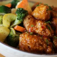 Sweet Chili Bowl · Chicken breast nuggets tossed in sweet chili ginger sauce. Served with choice of rice or qui...