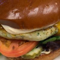 Chicken Burger  · Fresh ground chicken breast grounded with cilantro, jalapeño and mixed spices.
Grilled and t...