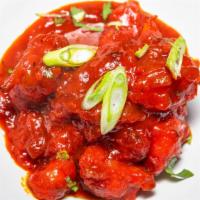 Gobi Manchurain · Spicy, vegetarian. Deep fried cauliflower cooked with spices and Manchurian sauce.