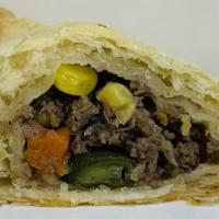 Ground Beef With Mix Vegetable P.P. - 1 Piece · It's flaky and light puff pastry stuffed with ground beef, onion, mix vegetables (peas, corn...