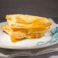 Apricot Turnover P.P. - 1 Piece · It's filled with sweet and savory of cooked apricot syrup, then baked and glazed with sugar
...