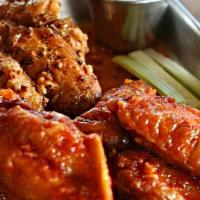 Wings · 5 Crispy wings tossed with your choice of wing spices or sauce.