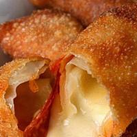 Pepperoni Rolls · 4 rolls filled with mozzarella cheese & pepperoni served with marinara dipping sauce