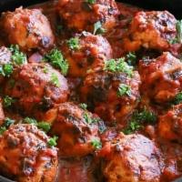 Meatballs · 4 meatballs hand-made with beef, veal and pork served with marinara sauce