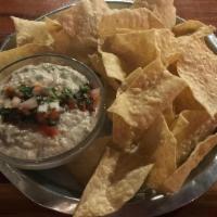 Black Eyed Hummus · Scratch made hummus from black-eyed peas.  Served with tortilla chips.