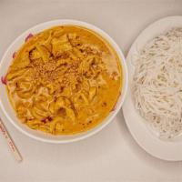 Coconut Curry  · Spicy yellow coconut curry souce stir fried with onions and one choice of protein serve with...