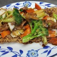 Stir-Fry Flat Rice Or Egg Noodle With Beef And Vegetables · Beef  and fresh vegetables stir fry with a tasty brown souce your choice of crispy or soft  ...