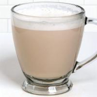 Hot Chai Tea Latte · An exotic and all natural blend of premium black tea, honey, vanilla bean, spices and milk.
