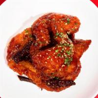 Wicked Wings · Generous mix of our crunchy, juicy twice-fried 6 piece wings glazed with a mouth-watering sa...