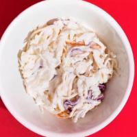 Creamy Slaw · Finely-shredded mixed vegetables tossed with a zesty mayonnaise dressing. Perfect for cleans...