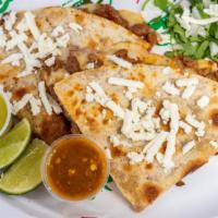 Large Quesadilla · Large flour tortilla with melted Mexican cheese and your choice of meat (bistec, pastor, or ...