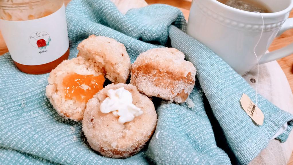  Mini Doughnut Muffins · Our homemade doughnut muffins, are baked fresh and are made with a collection of warm spices;  a tantalizing treat that is  perfect with your favorite coffee,tea, or juice.