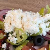 Greek Salad · Lettuce, bell pepper, tomato, onion, pepperoncini, black olive, cucumber, feta cheese.