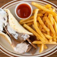 Gyro Wrap · Vertically grilled beef and lamb, thinly sliced, wrapped in fluffy pita bread with tomatoes,...