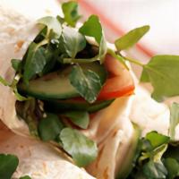 All Garden Club Wrap · Hummus, black olives, cucumbers, avocado slices, lettuce, and sliced tomatoes wrapped in hom...