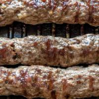 Koobideh (Kofta) Kabob · Two skewers of premium ground beef mixed with Dallah special spices and fresh onion relish. ...