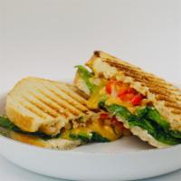 Ryg Panini · (Red, Yellow, and Green vegetables). Roasted red peppers, arugula, spinach, melted Gouda che...