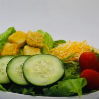 Side Salad · Romaine Lettuce, Fiesta Cheese, Cucumbers, Tomatoes, Croutons.