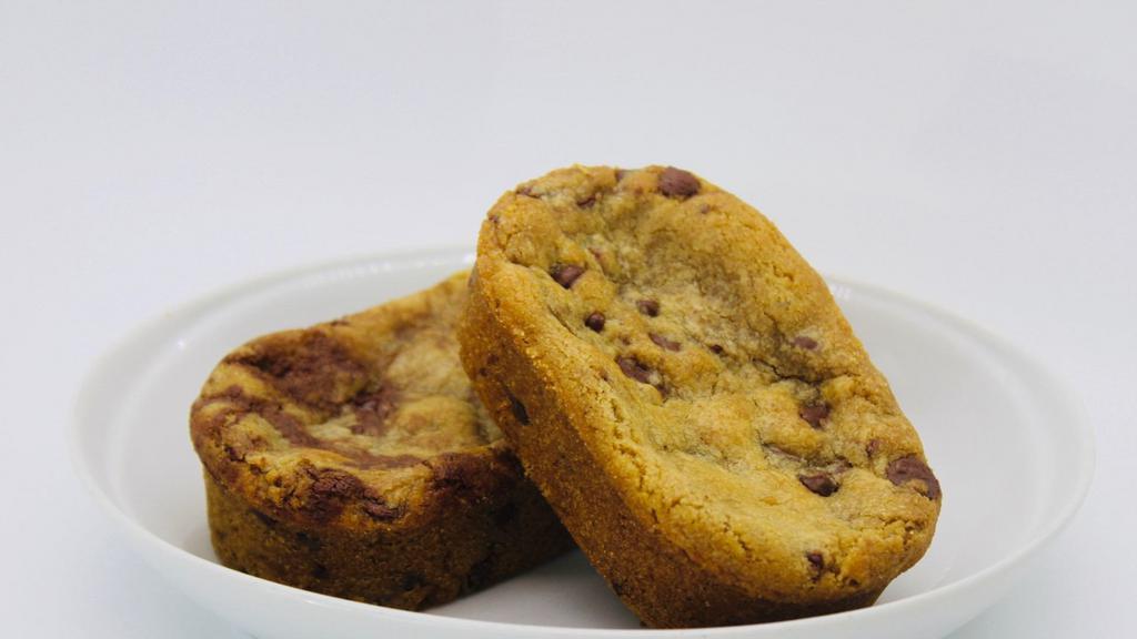 Chocolate Chip Cookie · Homemade Chocolate Chip Cookie served fresh and warm to order.